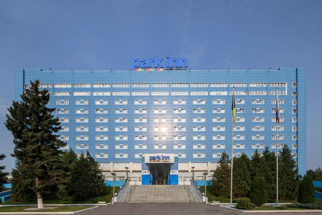 Cosmos moscow sheremetyevo airport hotel. Гостиница Park Inn Шереметьево. Парк ИНН Рэдиссон Шереметьево. Гостиница парк ИНН Шереметьево. Park Inn в Шереметьево, Москва.